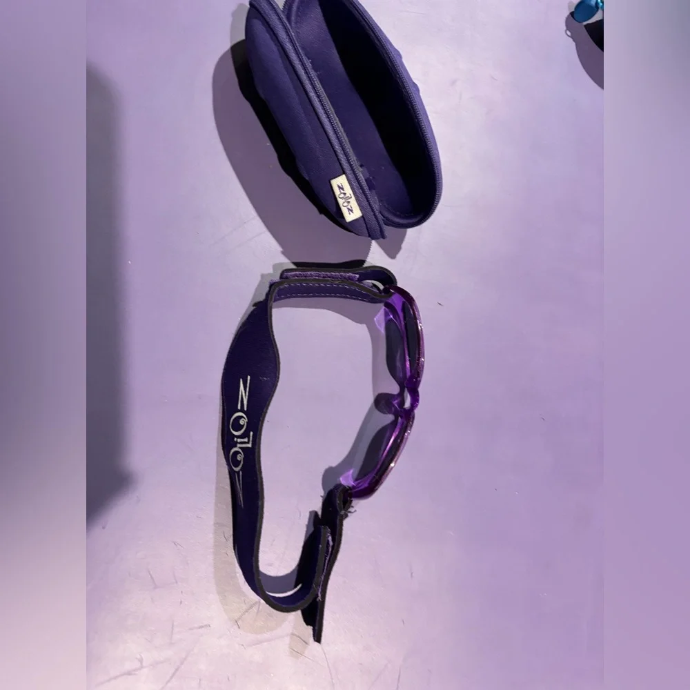 Baby sunglasses. Approx Sz 6-18 months. Velcro is adjustable. Comes with case.